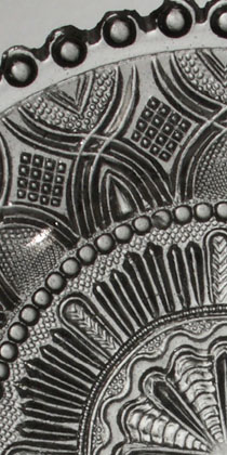 Detail of plate with round cap ring (11K)
